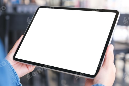 Preview: Mockup image of a woman holding digital tablet with blank desktop screen in cafe