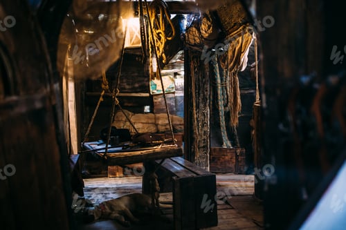 Preview: Old pirate ship. Quest room interior in style dangerous adventure. Wooden winch of a sailing ship.