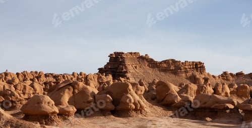 Preview: Red Rock Formations and Hoodoos in the Desert at Sunrise.