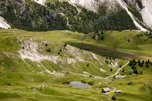 Preview: Mountain huts with the beautiful mountainous landscape of Val Gardena in Dolomites.