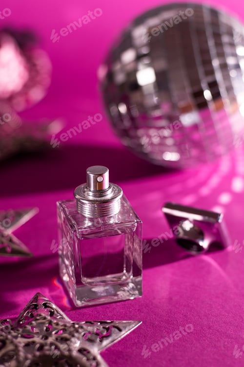 Preview: ottle of women's perfume on a pink background. Eau de Toilette. Aroma and smell. Care concept.
