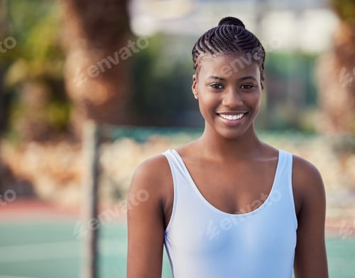 Preview: Shot of an attractive young woman standing alone on a tennis court