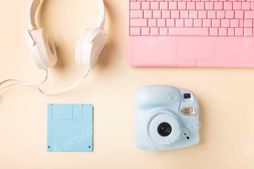 Preview: camera laptop headphones and floppy diskette in bright colors.