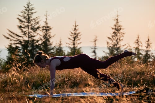Preview: Pretty girl doing one leg bridge pose.