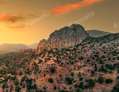 Preview: Sunset over rugged mountain landscape
