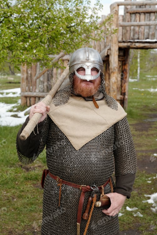 Preview: Portrait of Viking Reenactor Standing in Historic Outfit