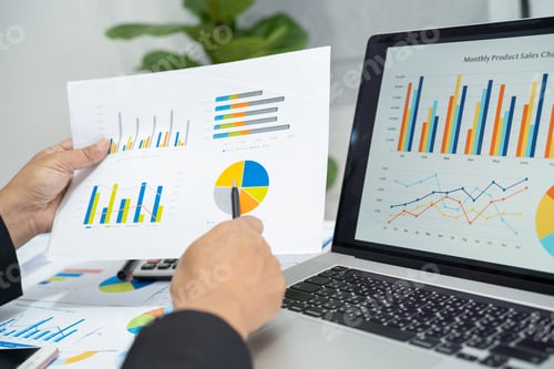 Preview: Asian accountant working and analyzing financial reports project