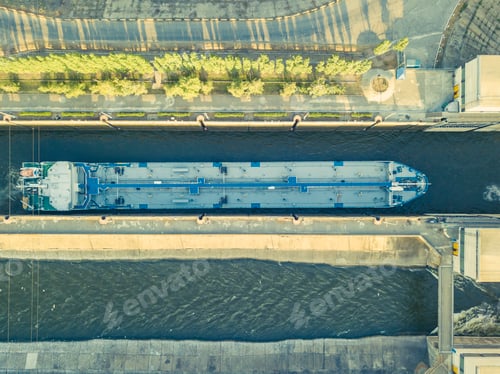 Preview: aerial view of barge ship on the river in gateway dock near dam f