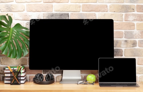 Preview: Stylish home studio workspace with computer, supplies and headphones