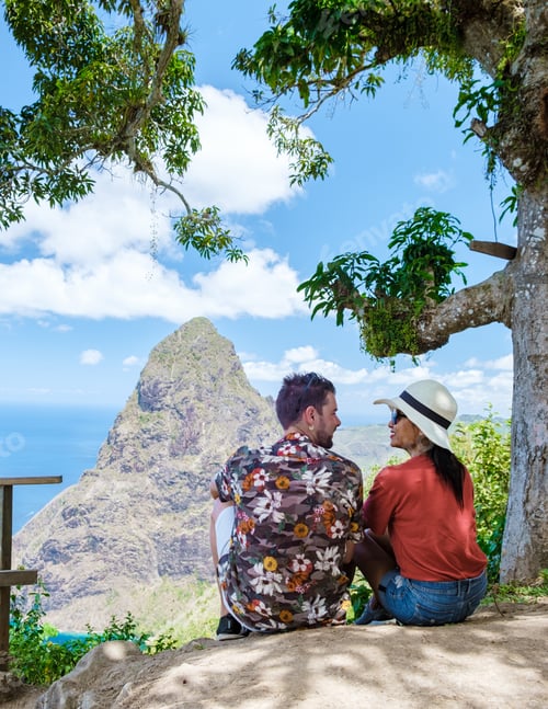 Preview: Couple hiking in Saint Lucia Caribbean, nature trail in the jungle of Saint Lucia huge Pitons