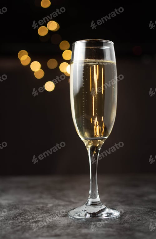 Preview: Glass of champagne to toast and celebrate Christmas and the New Year.