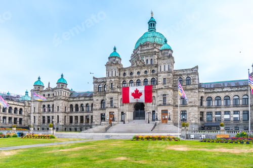 Preview: British columbia parliament buildings showing canadian flag in victoria, canada