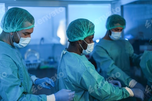 Preview: Doctors preparing to work in hospital during coronavirus pandemic outbreak - Focus on left man face