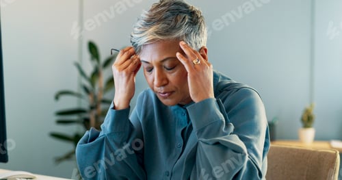 Preview: Stress, headache and burnout with a business woman suffering from anxiety while working in her offi