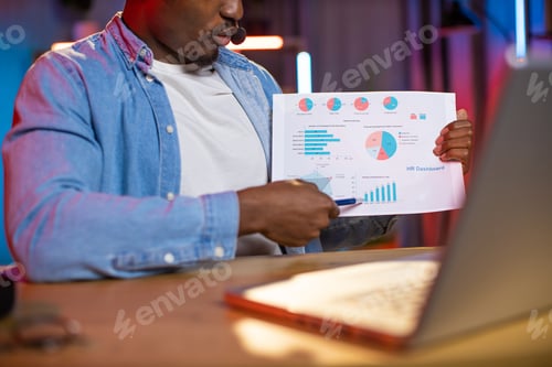 Preview: Close up of black man having video meeting on laptop