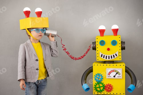 Preview: Happy child playing with robot