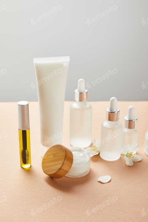 Preview: mascara bottle with natural oil, cream tube with hand cream, cosmetic glass bottles with serum,