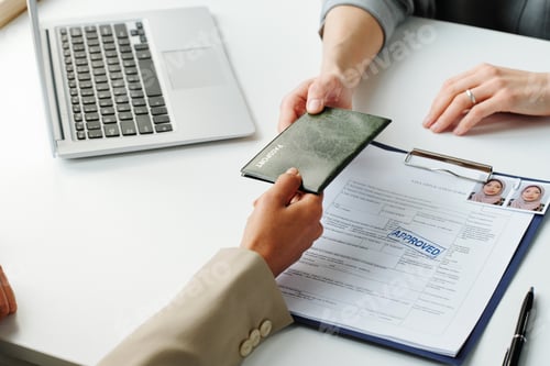 Preview: Woman Giving Passport To Consular Officer