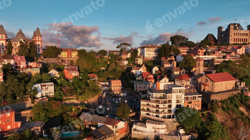 Preview: Aerial view of Antananarivo at sunset showcasing colorful houses and historical architecture