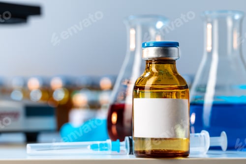 Preview: Vial of vaccine bottle with a syringe close up