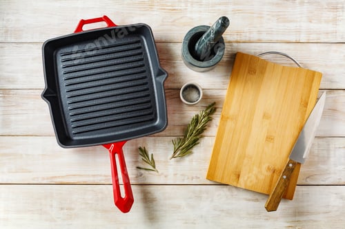 Preview: Empty cast iron pan and cutting board