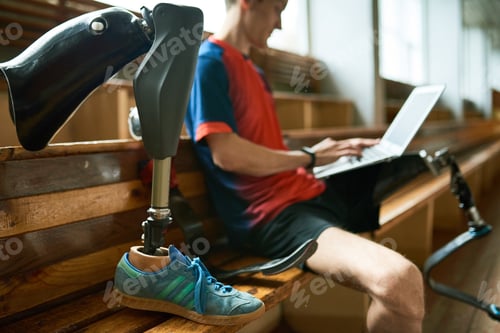 Preview: Disabled Sportsman Using Laptop