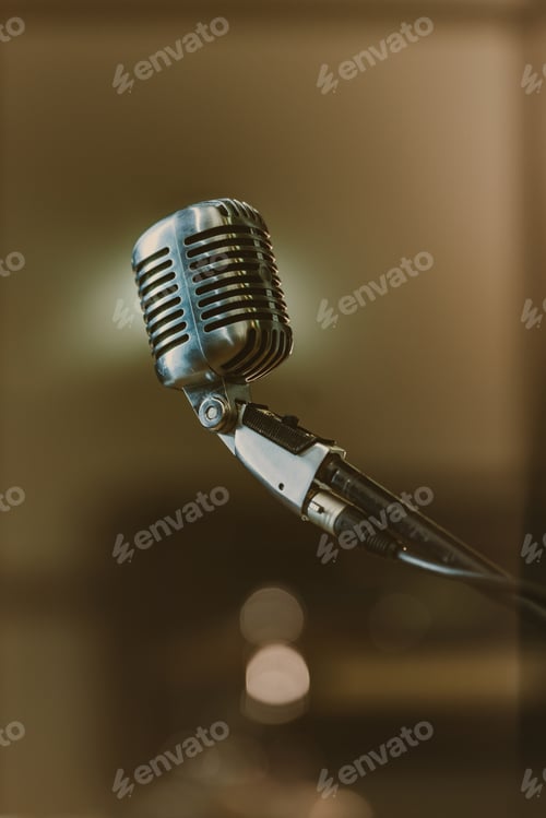 Preview: close-up shot of retro microphone on blurred background