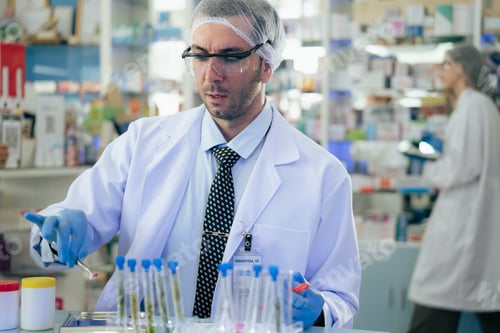 Preview: Scientist perform experiment of biochemistry with test tube