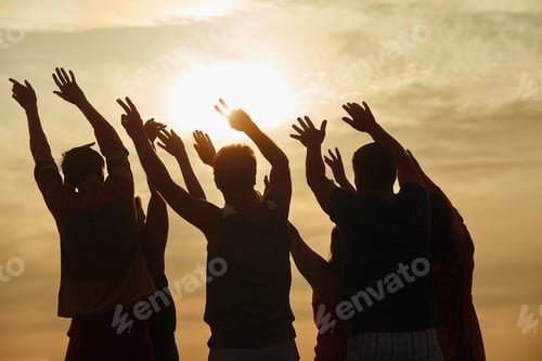 Preview: Hands up silhouette in sunny sky background.