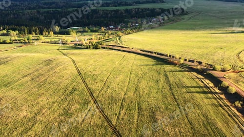 Preview: Top view of beautiful green fields and forests on sunny day. Clip. Green fields with roads and