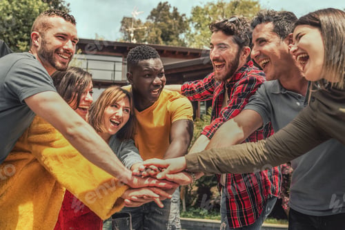 Preview: Multiracial Youth Group Uniting Hands Outdoors