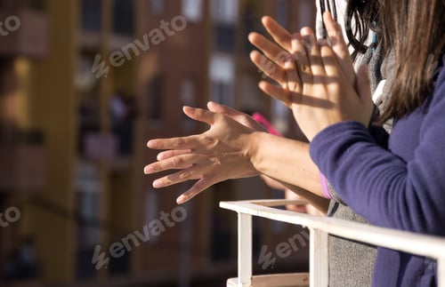 Preview: People in Spain clapping on balconies and windows in support of health workers, doctors-COVID-19