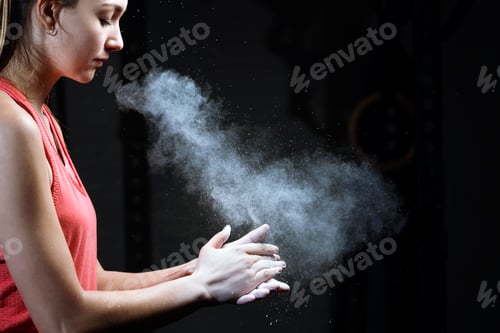 Preview: Woman clapping hands with chalk