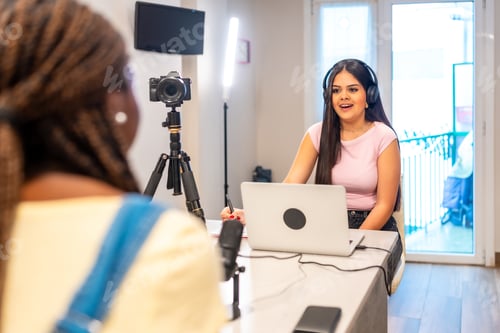 Preview: Teenage girls creating online content with digital equipment