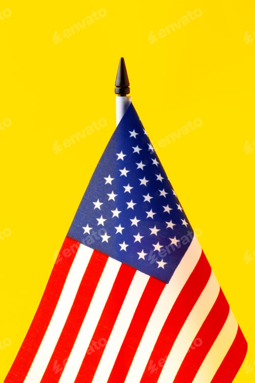Preview: Small United States Flag on a Vibrant Yellow Background