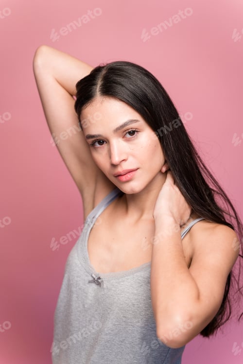 Preview: Young woman with long hair in studio