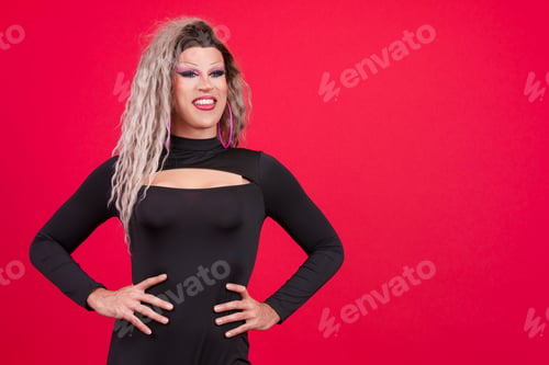 Preview: Relaxed transgender person with make up standing