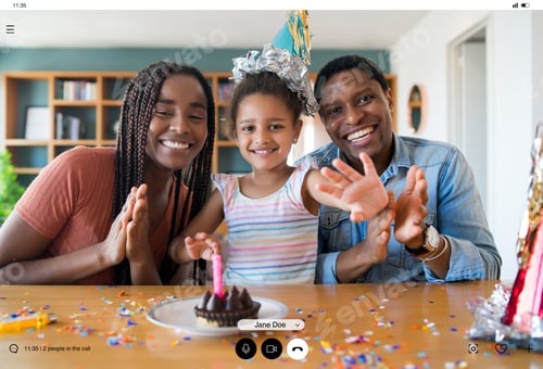 Preview: Family celebrating birthday on a video call.