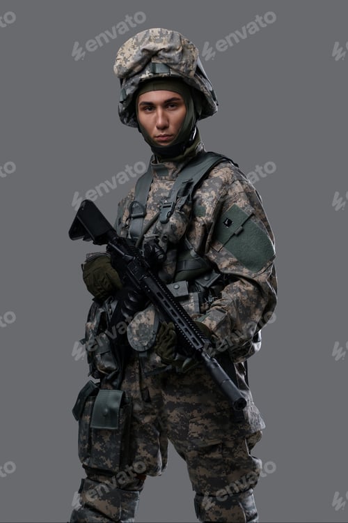 Preview: Camouflaged Soldier with Rifle in Studio Setting