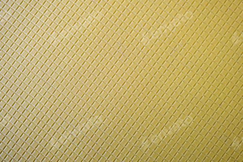 Preview: Close up of abstract yellow background with geometric pattern.