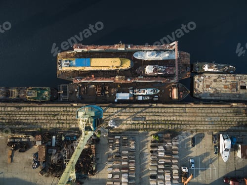 Preview: aerial view of various ships in industrial harbour