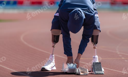Preview: Disabled athletes prepare in starting position ready to run on stadium track