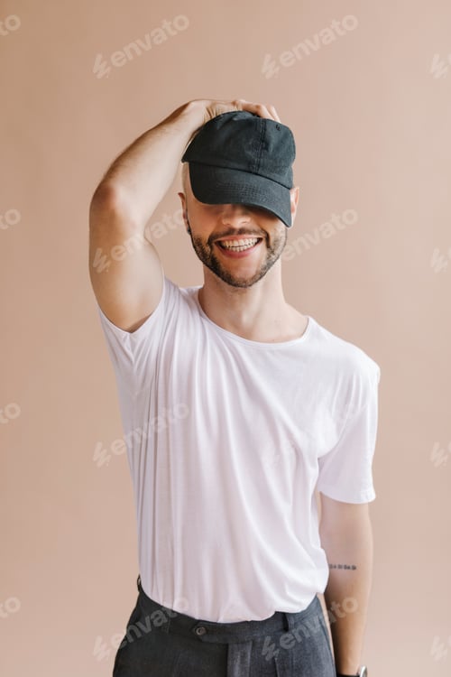 Preview: Playful man in a white tee