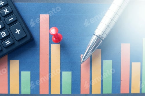 Preview: financial graph, calculator and pen on table