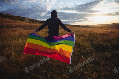 Preview: Young man with LGBT flag.