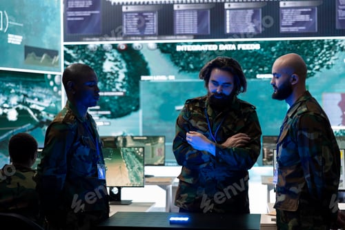 Preview: Diverse soldiers analyzing satellite images on a 3d hologram