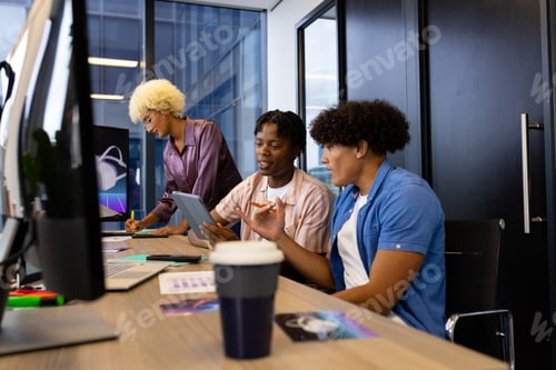 Preview: In modern office, a diverse young team collaborating