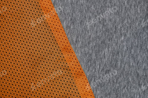 Preview: Top view of cloth textile surface. Close-up rumpled heater and knitted fabric texture