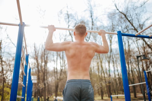 Preview: Man Takes on the Challenge of Pull-Ups at Outdoor Gym