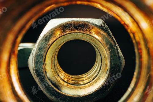 Preview: Metal nut on black background close up